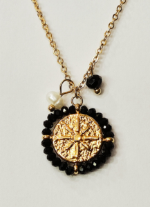 black and gold pendant